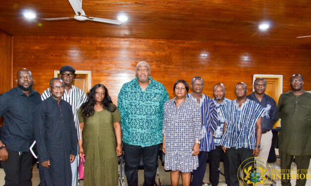 Henry Quartey consoles the Woyongo family